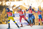 18.12.2021, xkvx, Biathlon IBU World Cup Le Grand Bornand, Pursuit Men, v.l. Jesper Nelin (Sweden), Simon Eder (Austria), Benjamin Weger (Switzerland) in aktion / in action competes